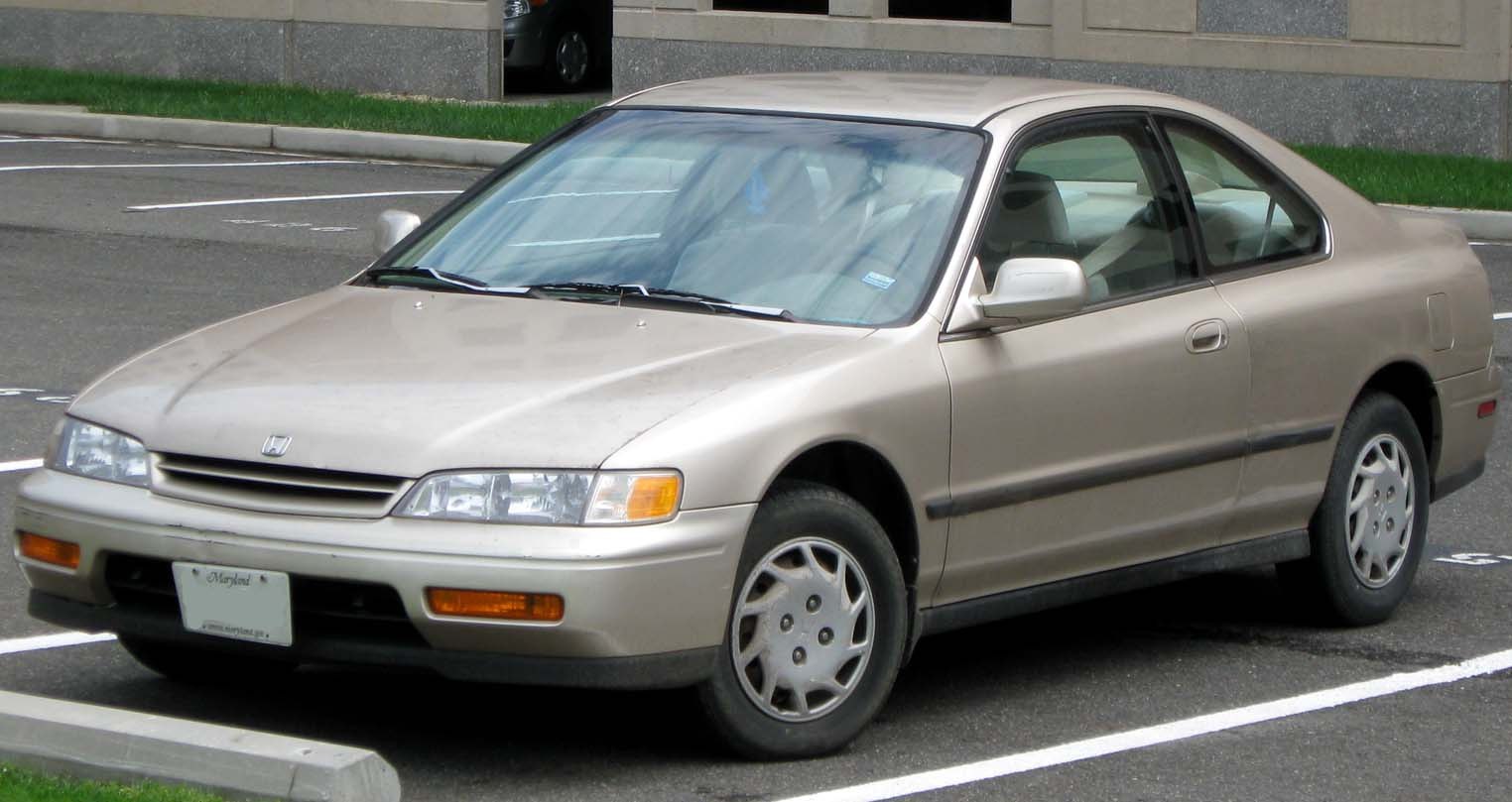 Mid-90s coupe with sleek front grille and compact aerodynamic shape