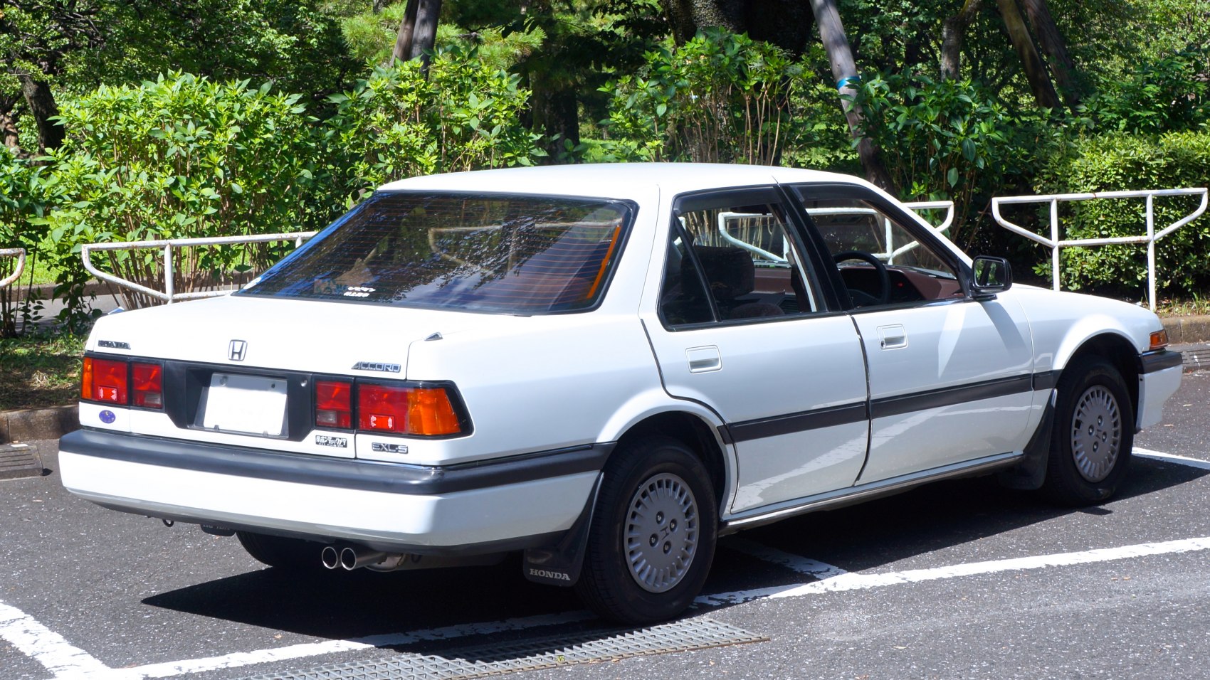 Classic sedan rear with distinct taillights and boxy design