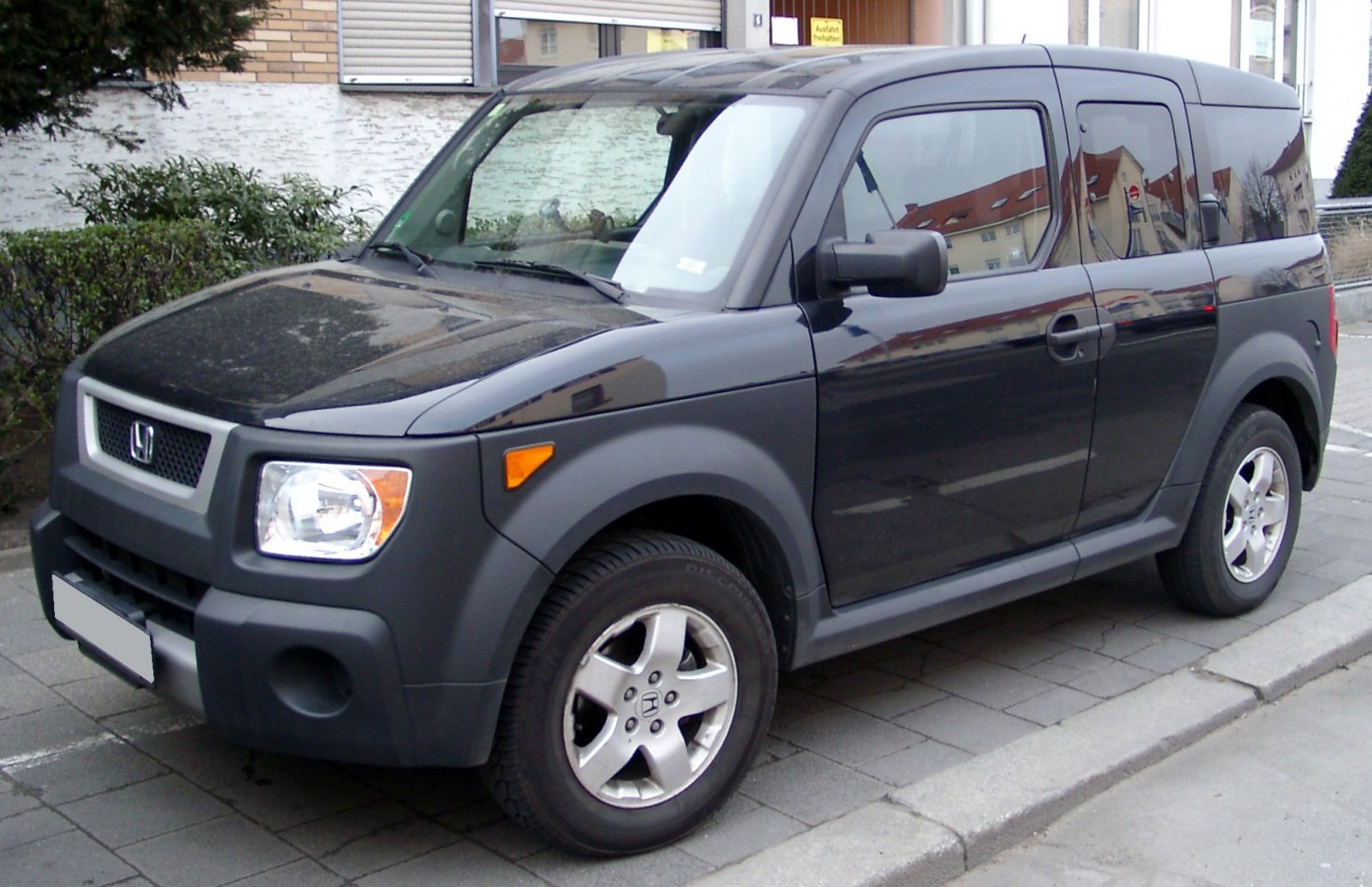 Front-side view with boxy shape and square headlights