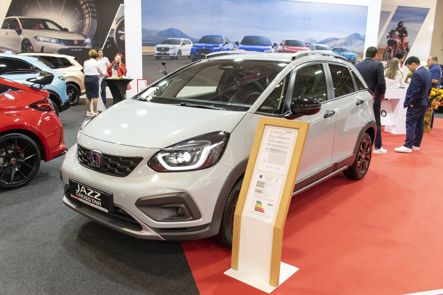 Front angled view with LED headlights and modern grille
