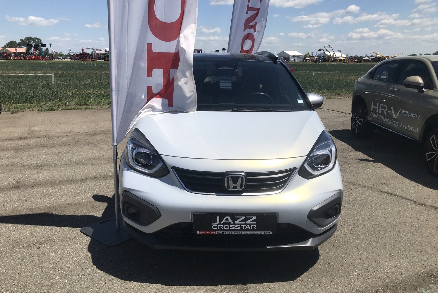 Front view showcasing headlights and grille of a compact crossover vehicle.