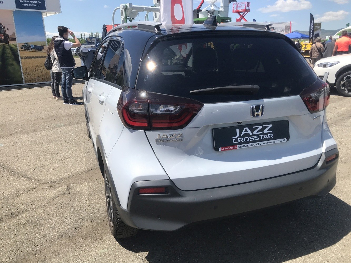 Rear view with distinctive taillights and sporty bumper
