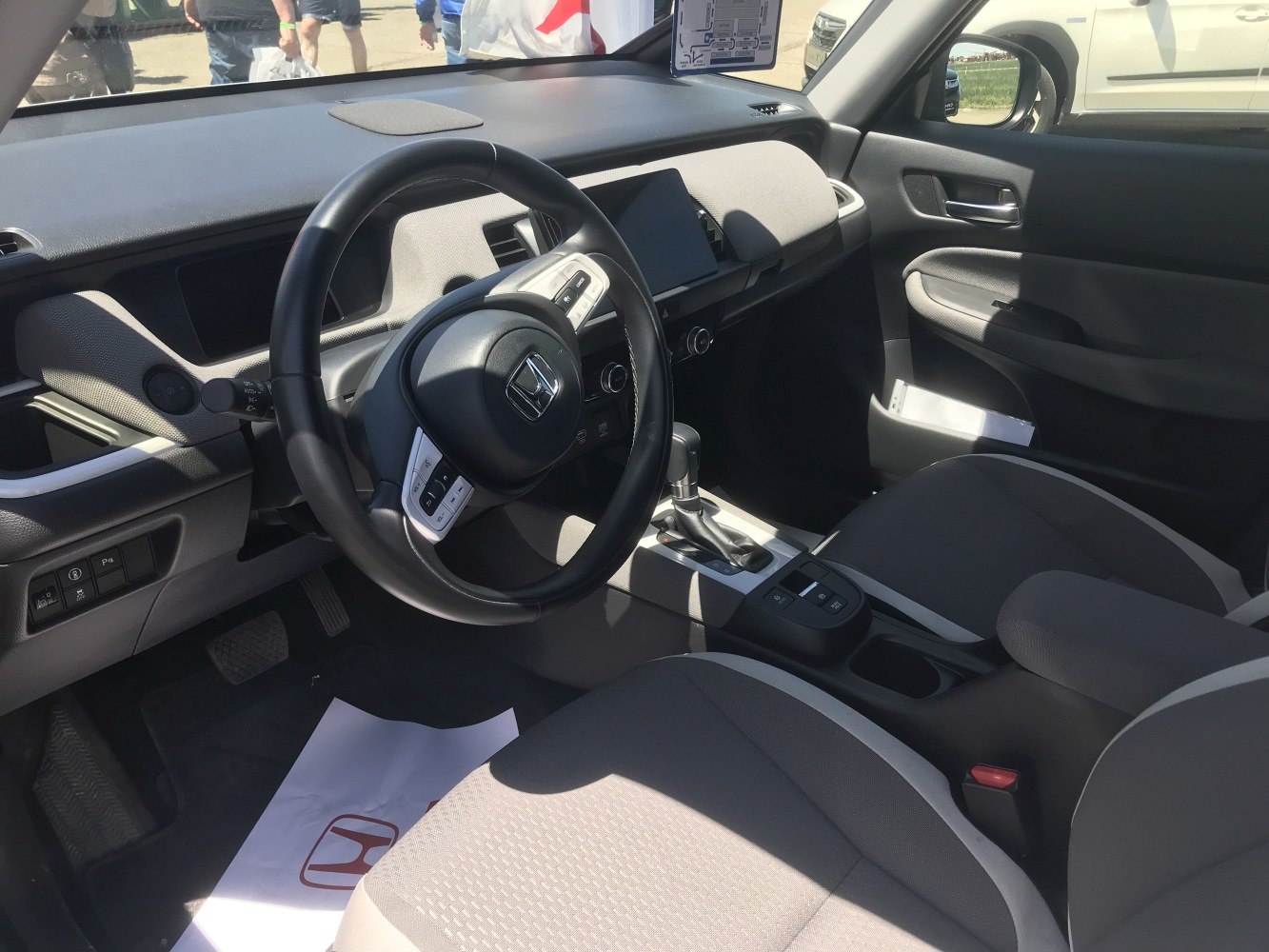 Modern dashboard and multifunction steering wheel with ergonomic seating
