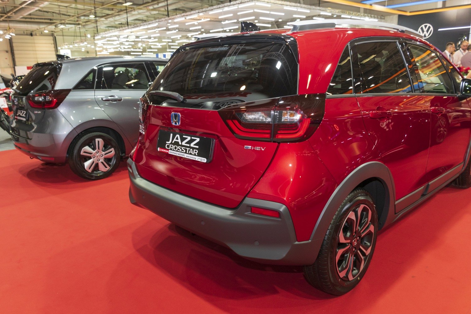 Rear view highlights LED taillights, alloy wheels, and rear bumper design.