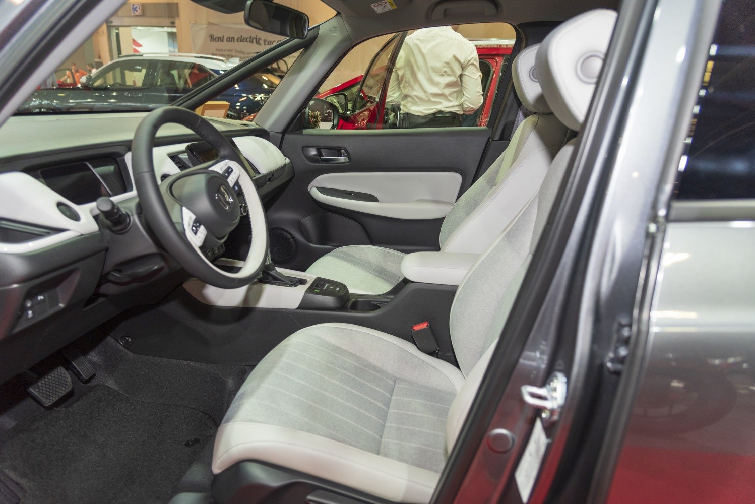 Spacious front cabin with ergonomic dashboard and modern steering wheel