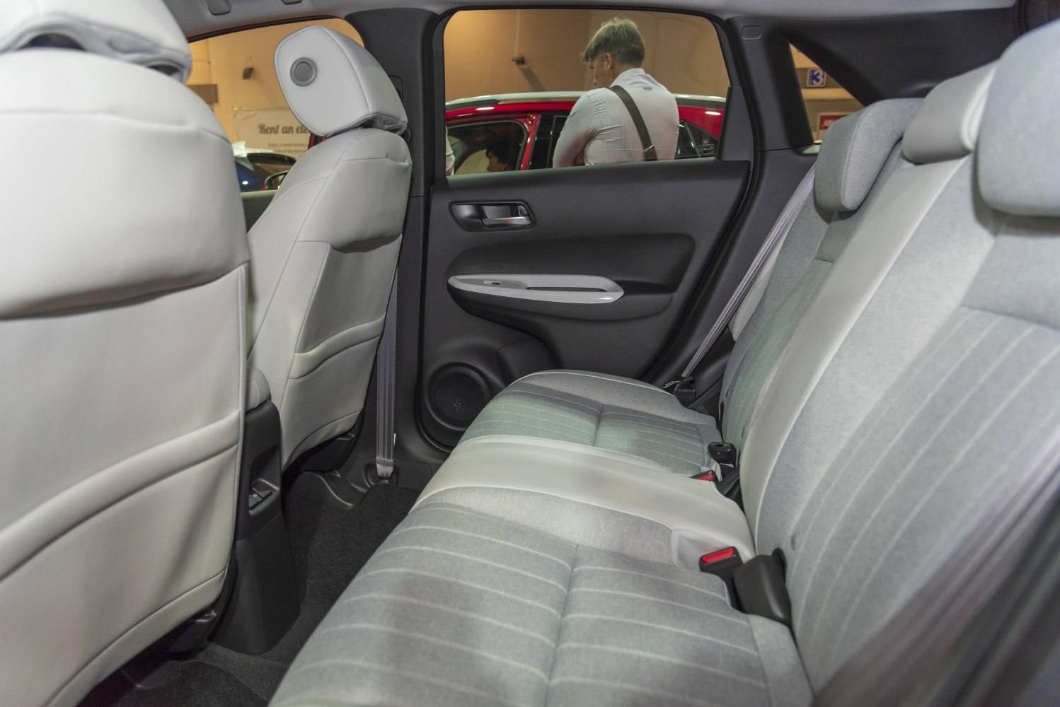 Rear seat fabric and leather upholstery with door panel details