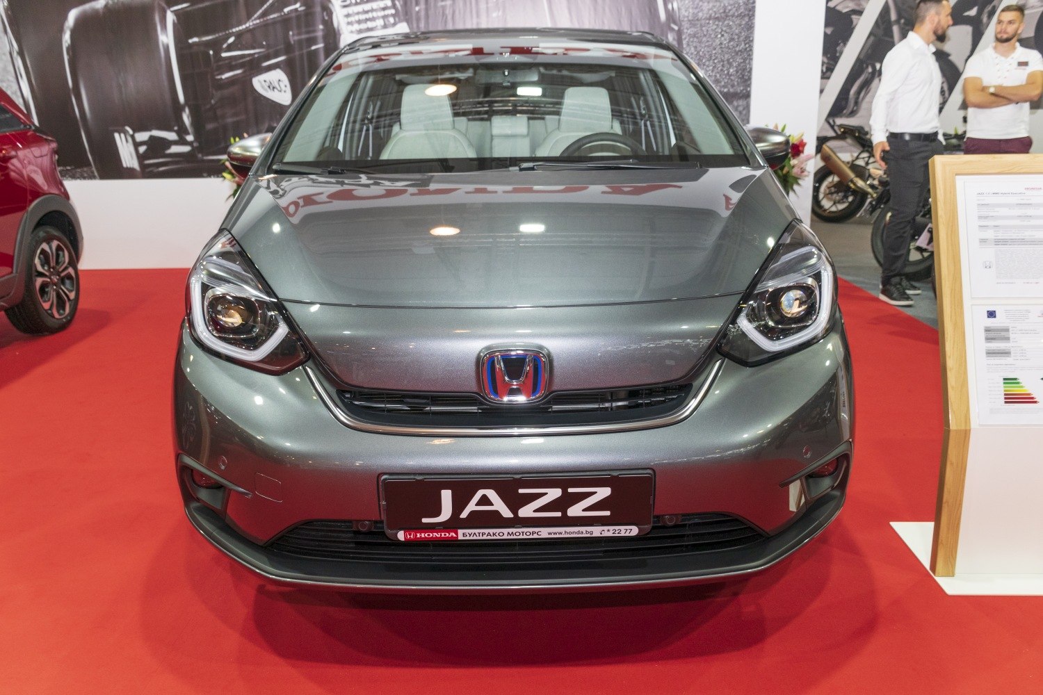 Front fascia with LED headlights and Honda emblem.