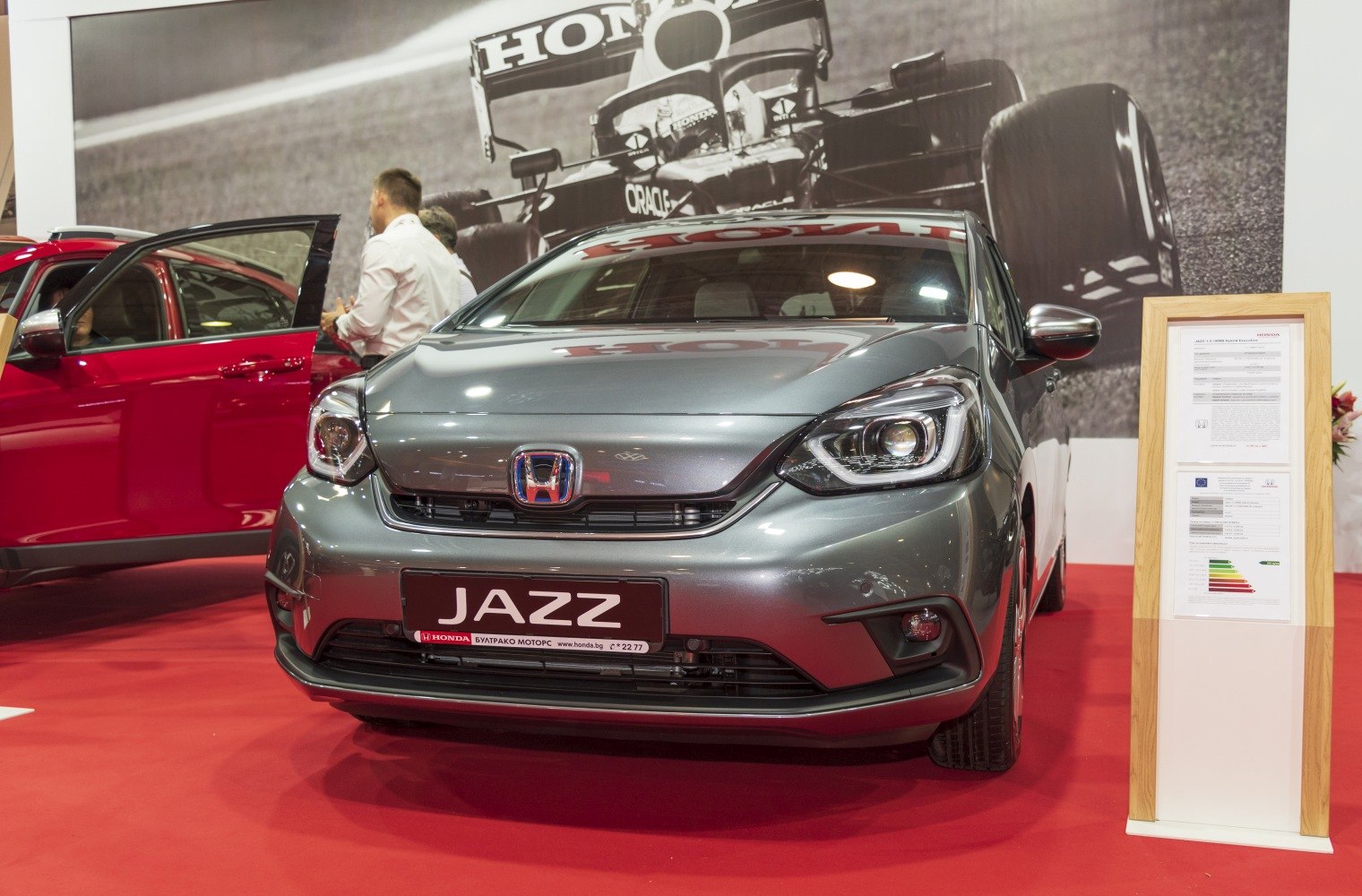 Front view with LED headlights and black grille