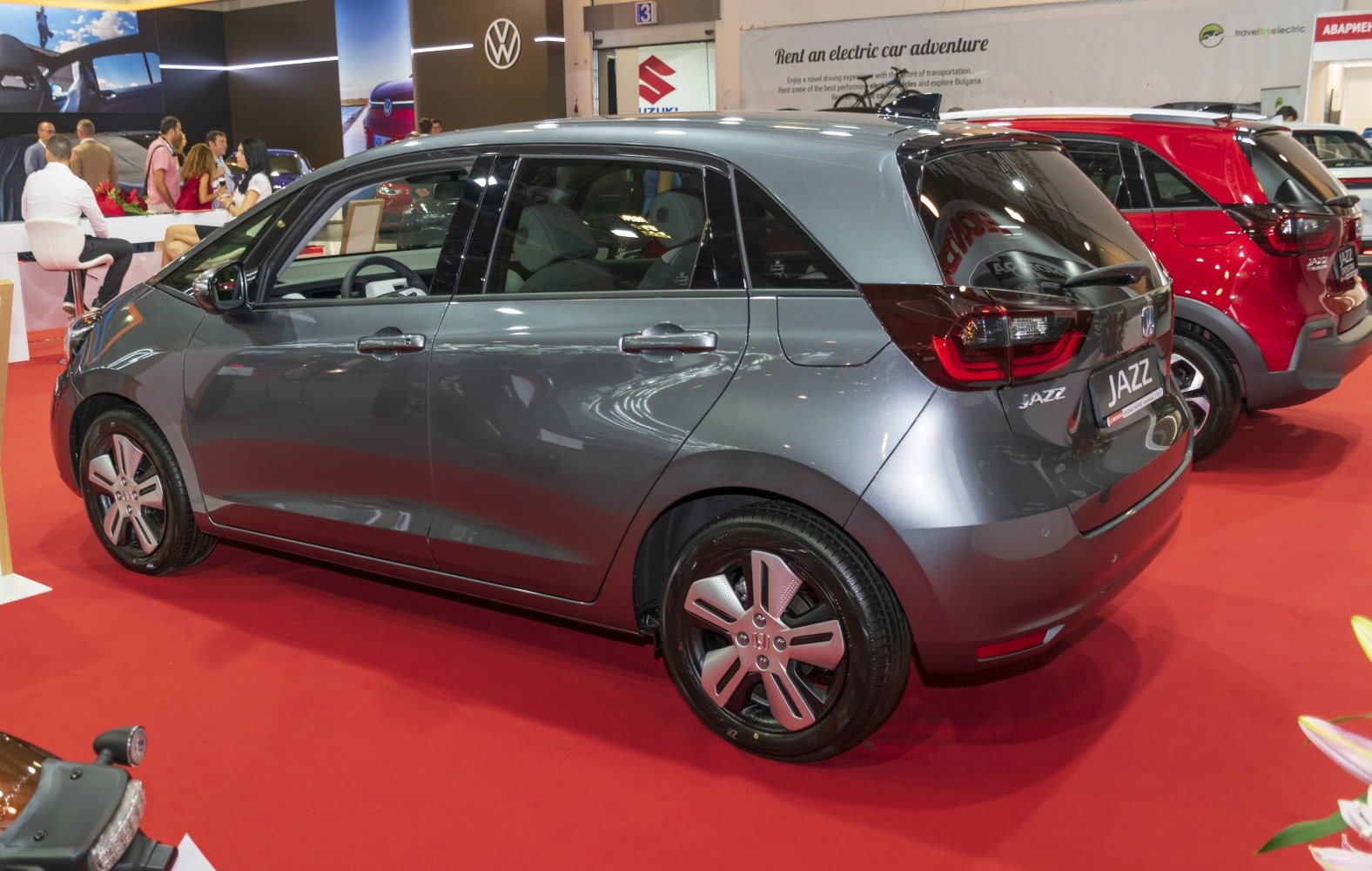 Side and rear view of compact hatchback with modern taillights and five doors