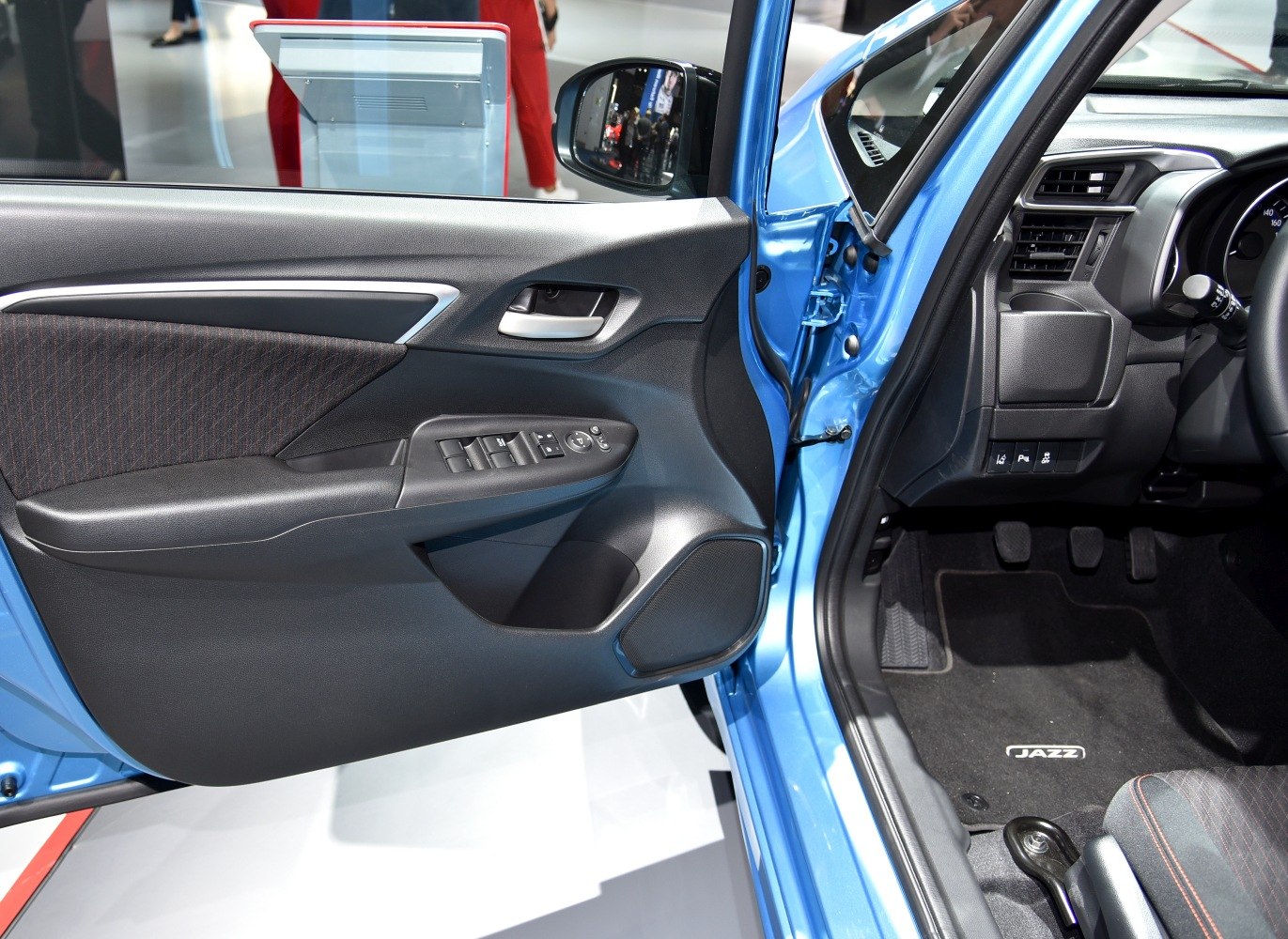 Interior door panel with controls and floor area