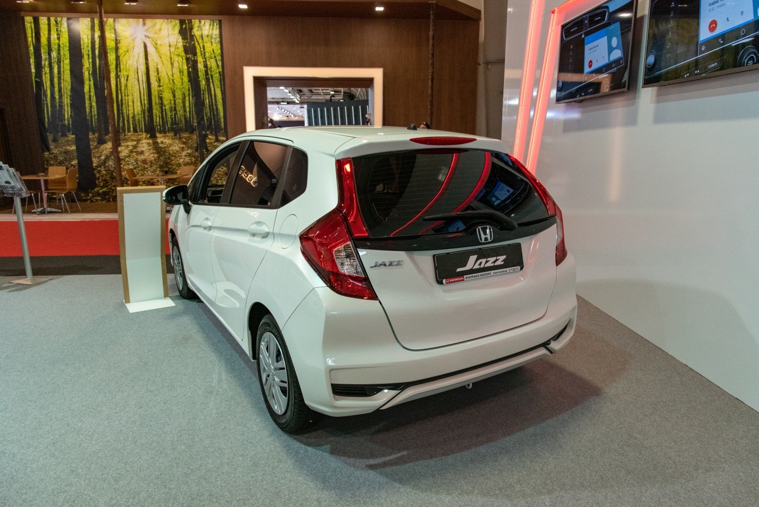 Rear view of a hatchback with vertical taillights and tinted rear window