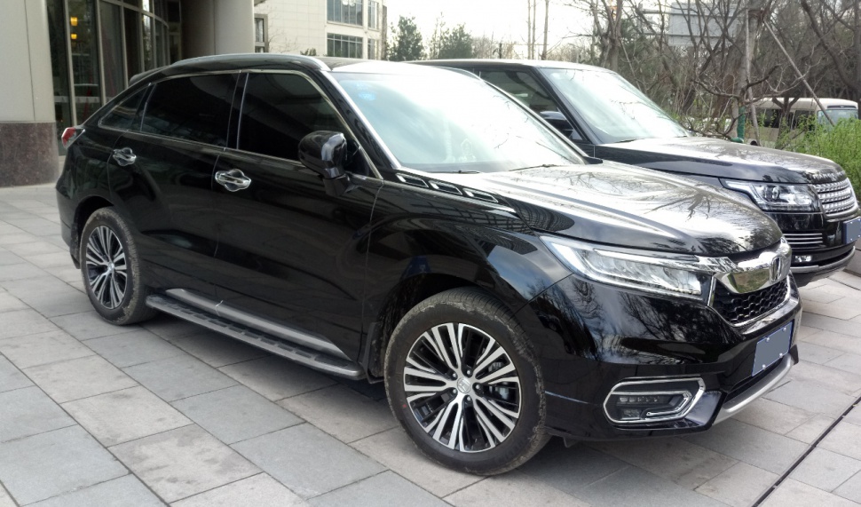Black SUV with LED headlights and multi-spoke alloy wheels