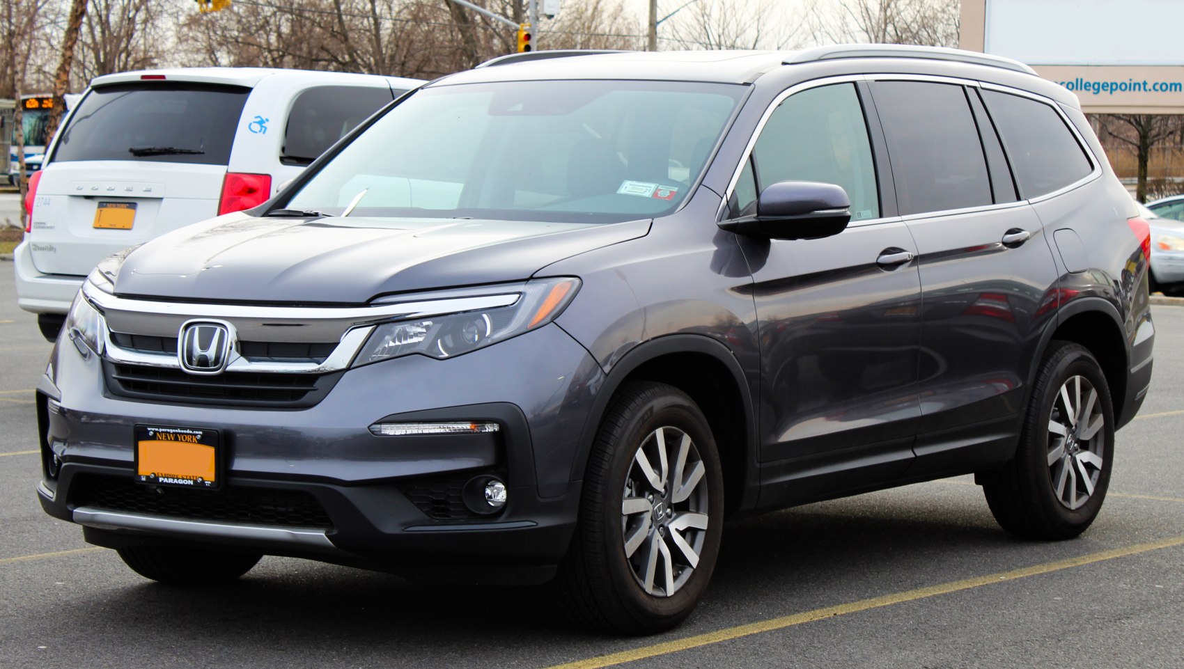 Front-side view with LED headlights and alloy wheels