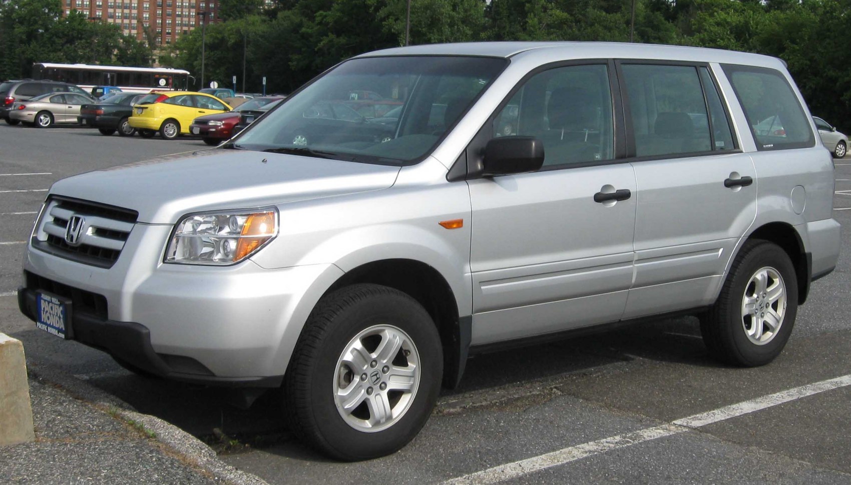 Silver mid-size SUV, front side view with wheels