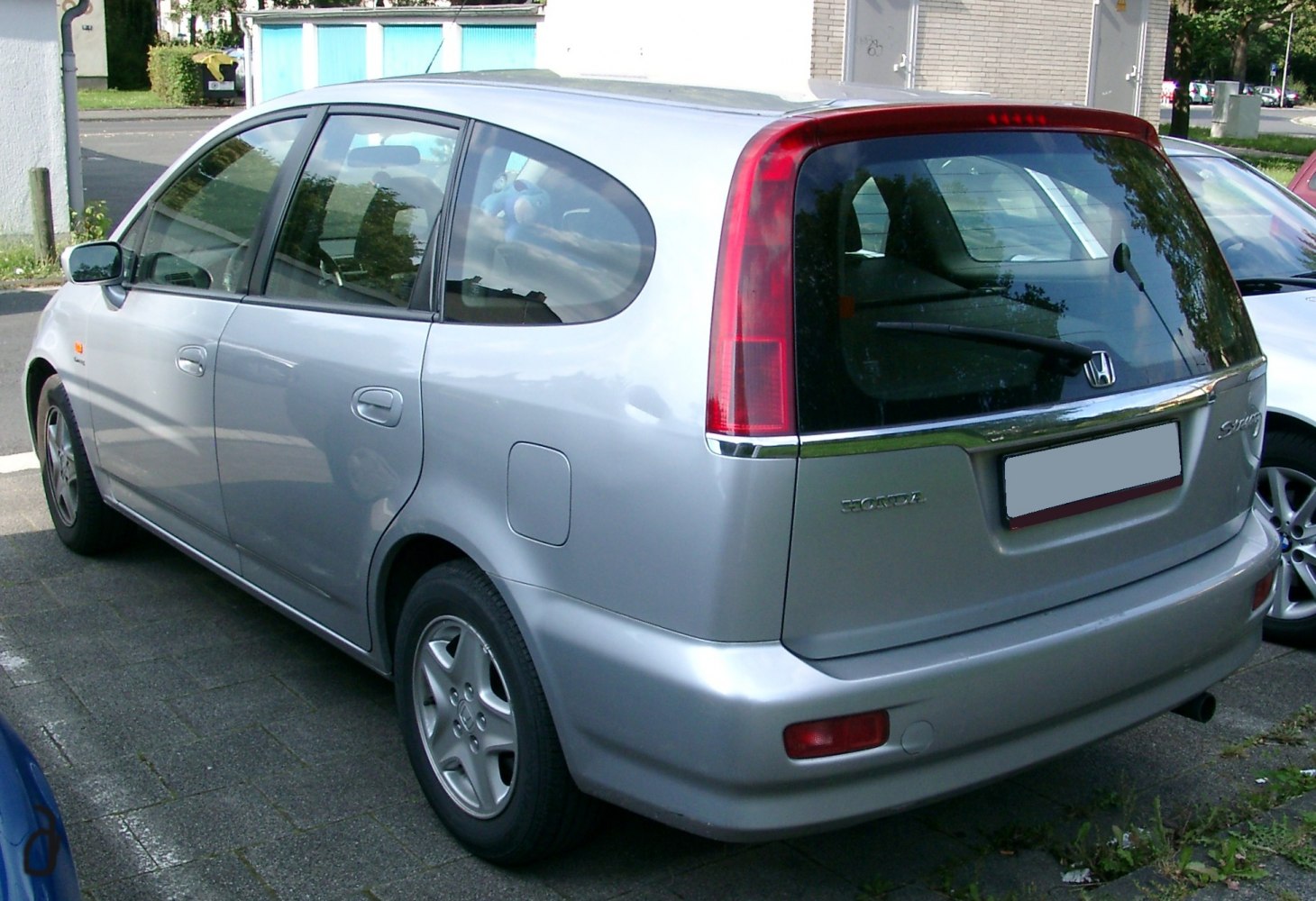 Vertical tail lights and large rear window with rear windshield wiper