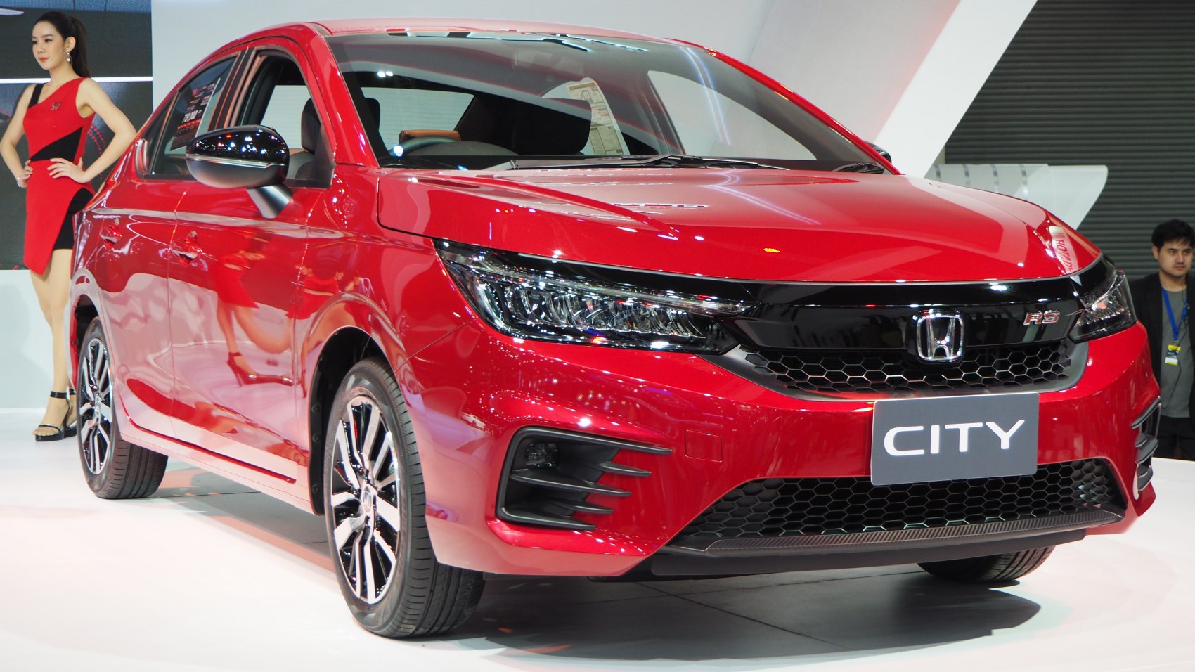 Front view with RS badge, LED headlights, sporty grille, and alloy wheels