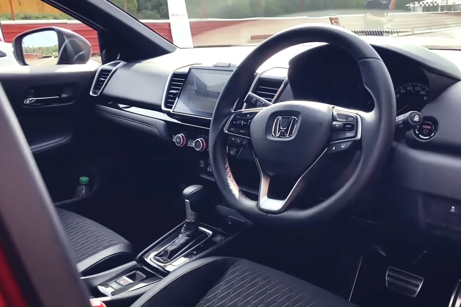 Modern dashboard and multifunction steering wheel with automatic gear shift