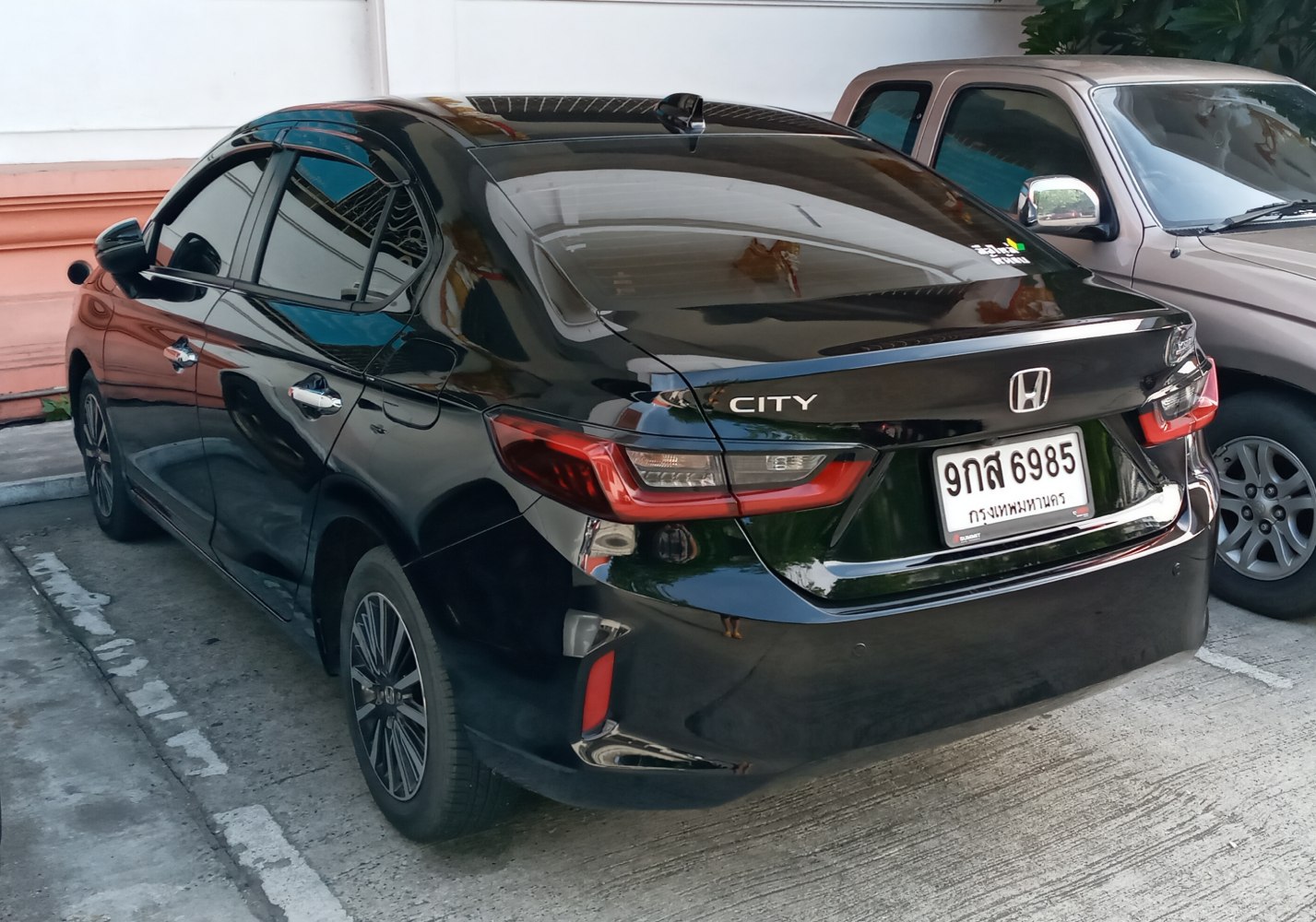 Sleek rear view with modern tail lights and trunk design