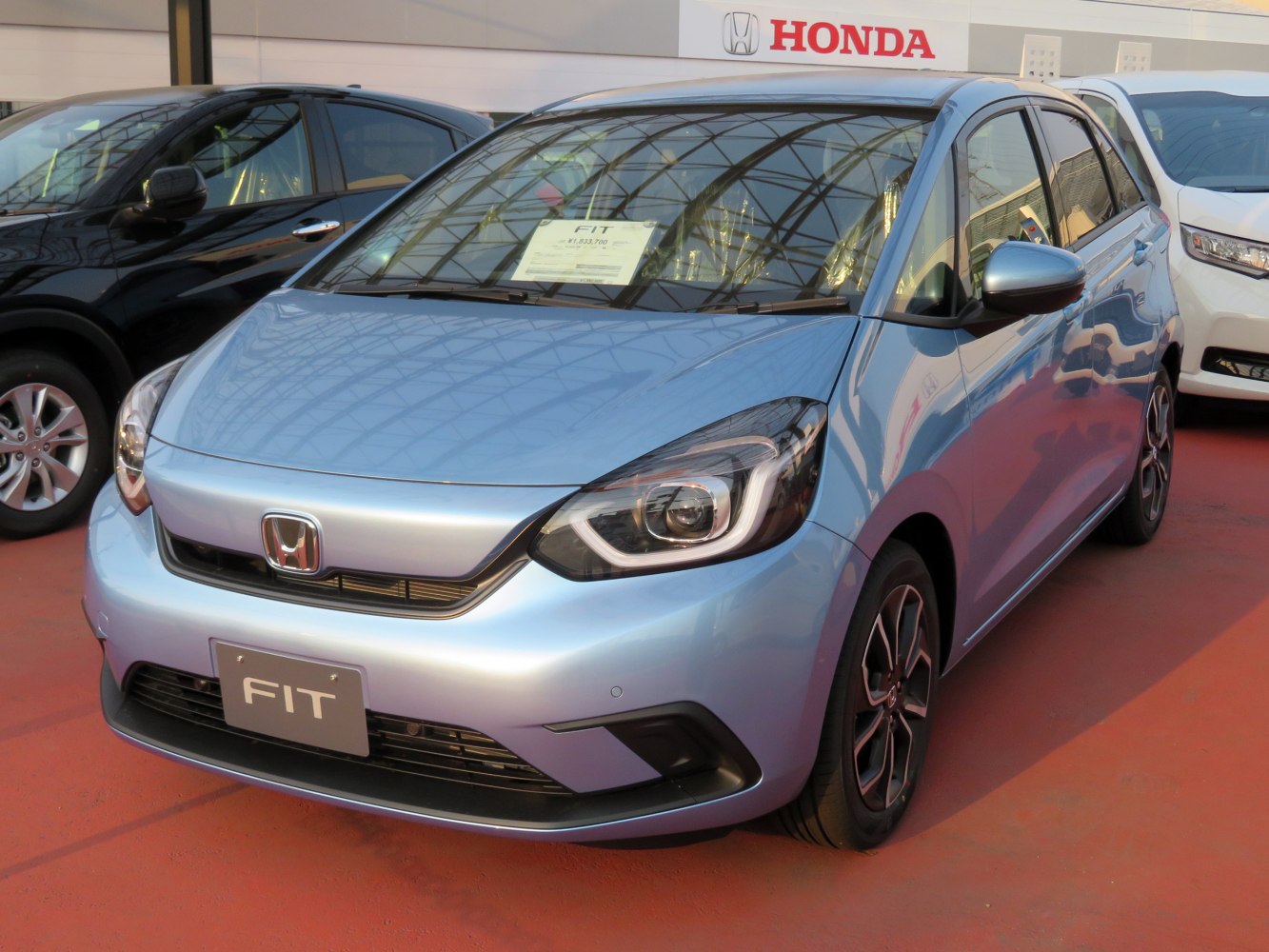 Compact hatchback with LED headlights front view