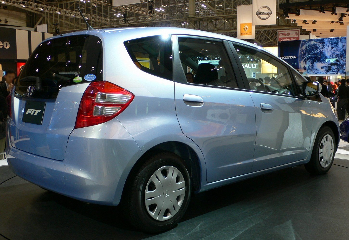 Rear and side view of a compact hatchback with distinct taillights