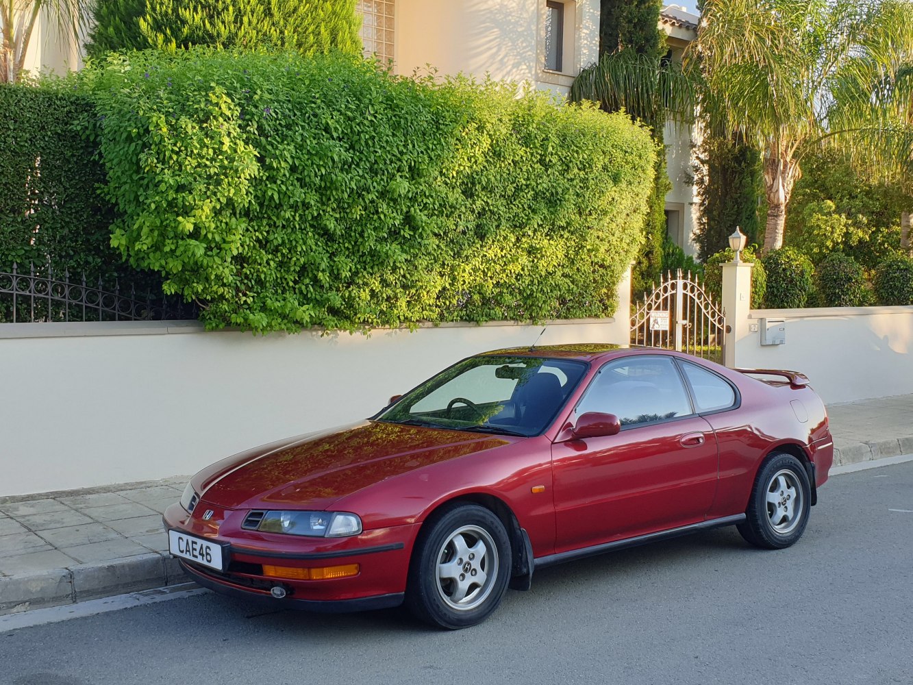 1990s sports coupe with pop-up headlights and rear spoiler
