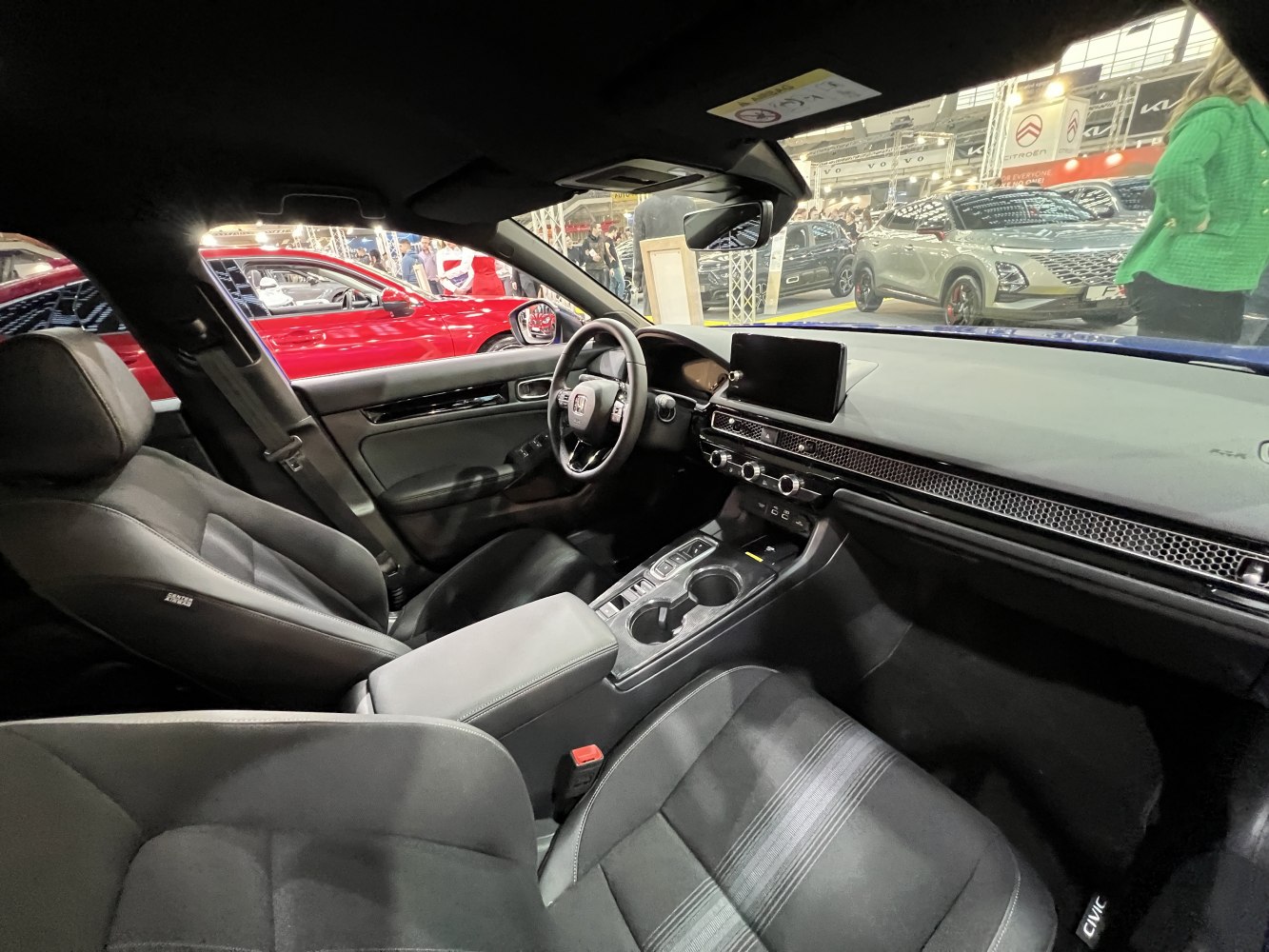 Modern car interior with digital dashboard and central screen