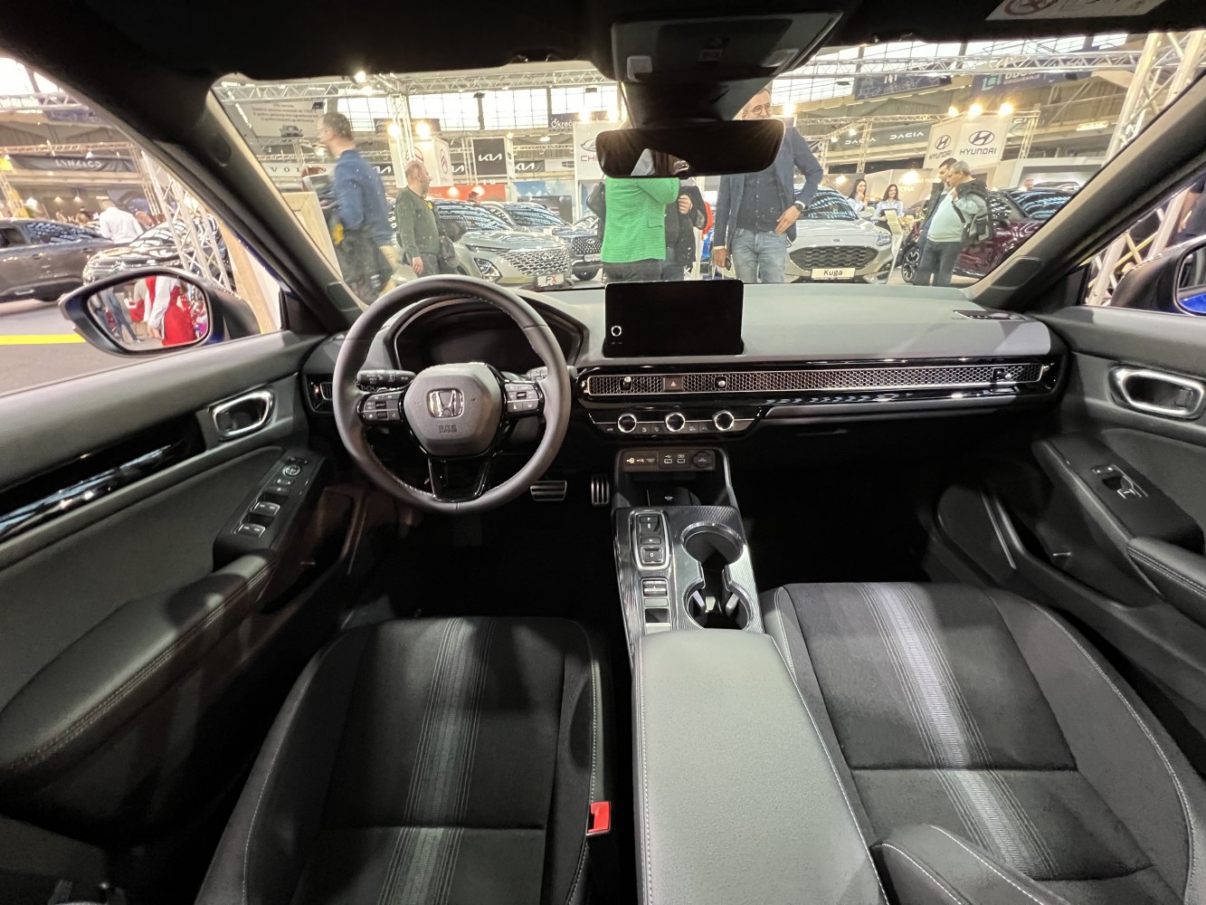 Modern car interior with digital dashboard and touchscreen display