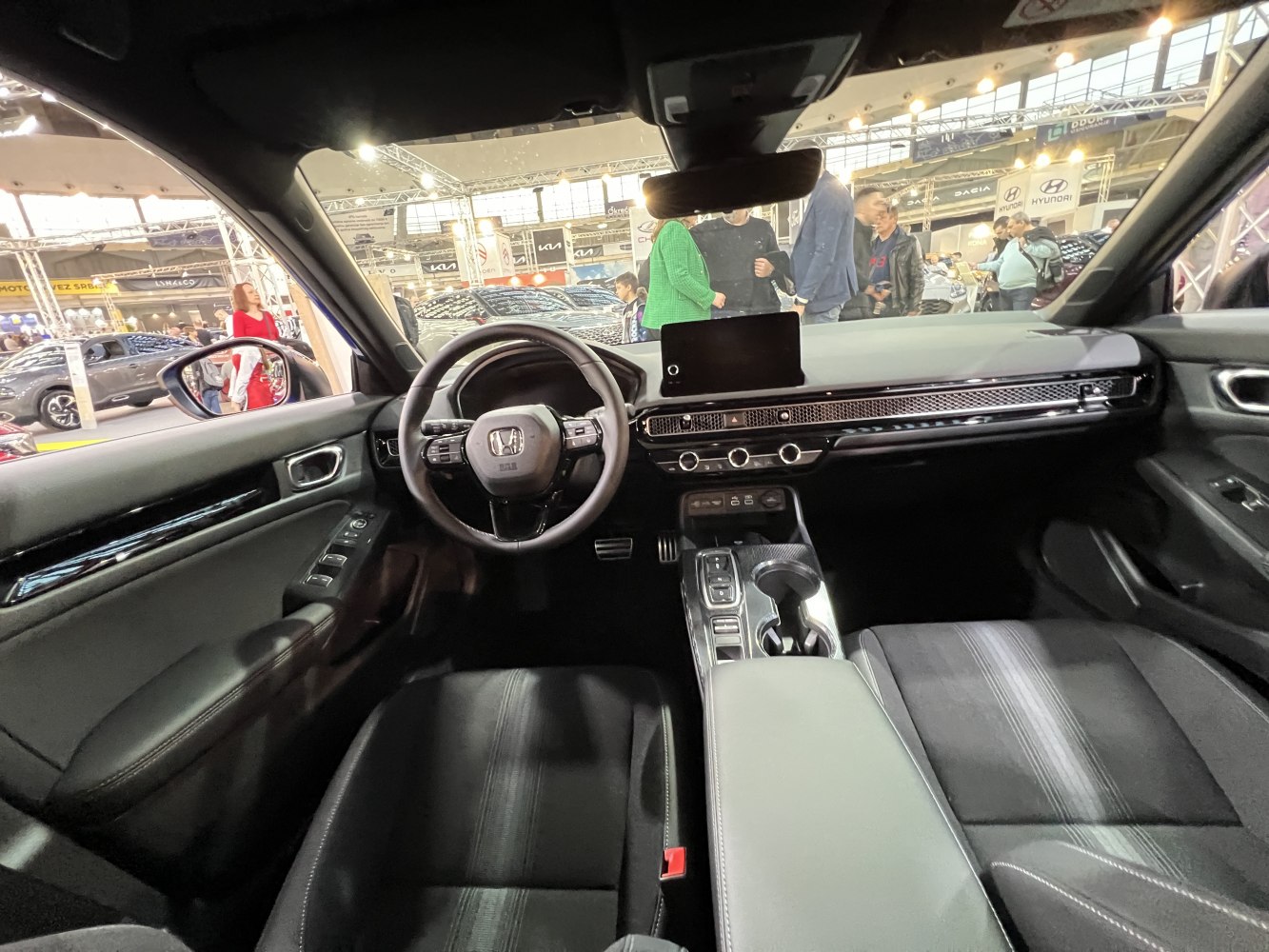 Modern car interior with dashboard and steering wheel