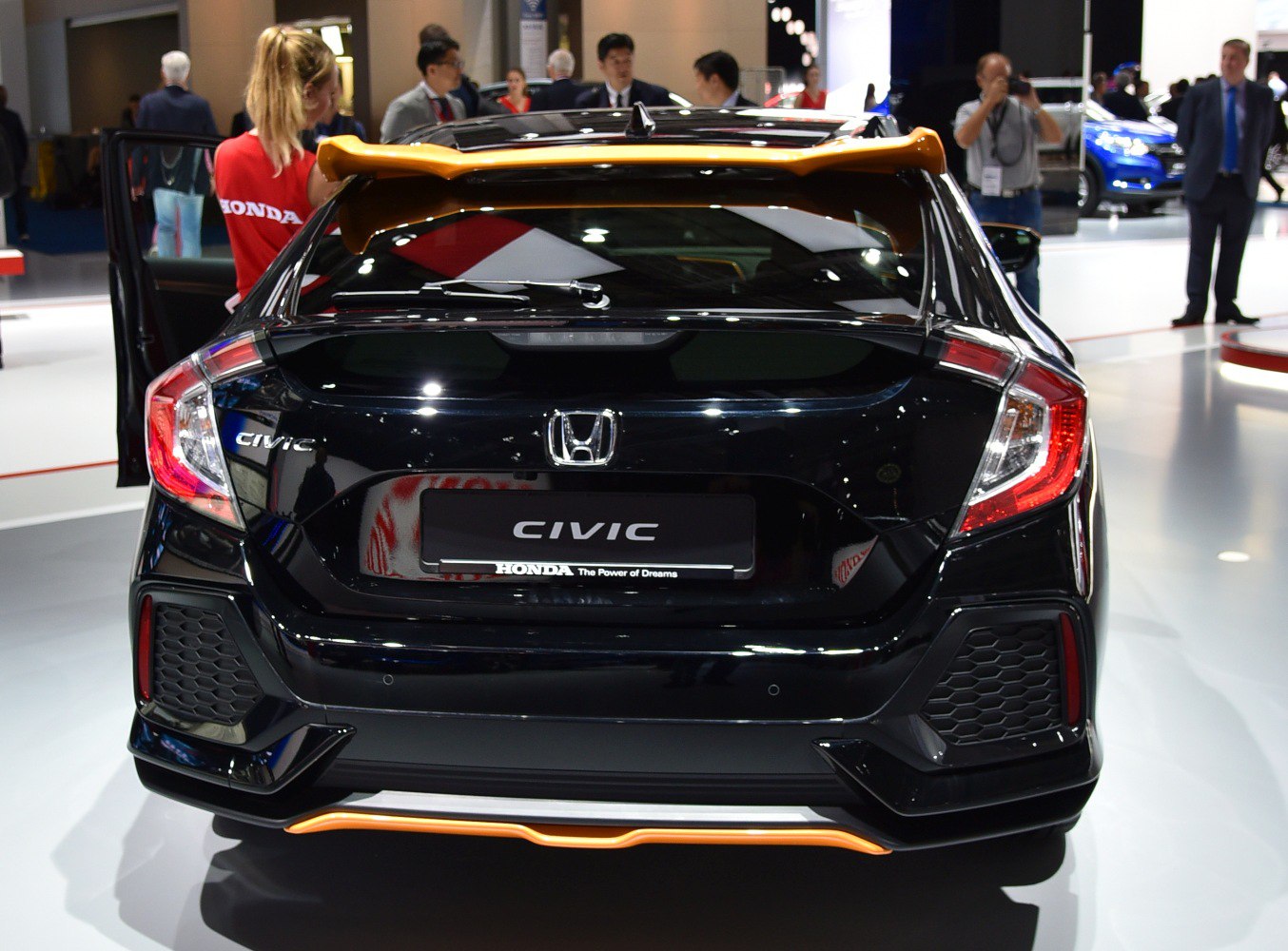 Rear view of a hatchback with distinctive taillights and sporty spoiler