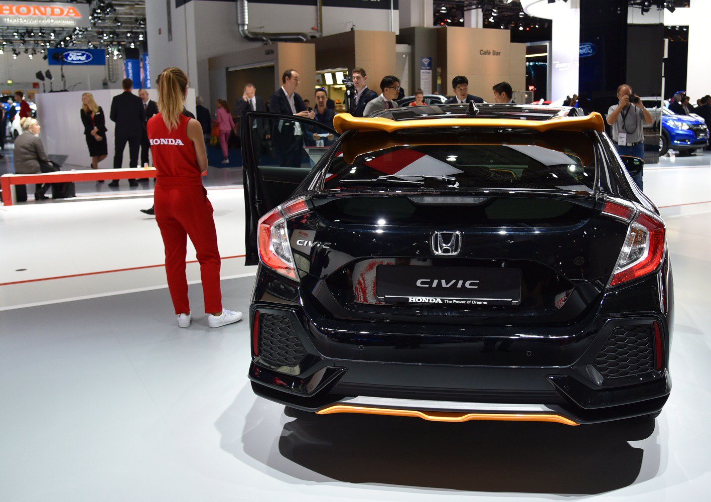 Rear view with distinctive spoiler and angular taillights.