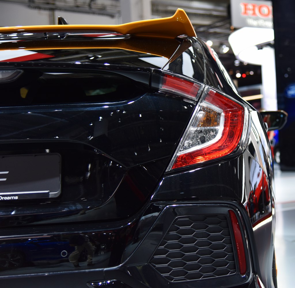 Close-up of hatchback rear taillight and roof spoiler