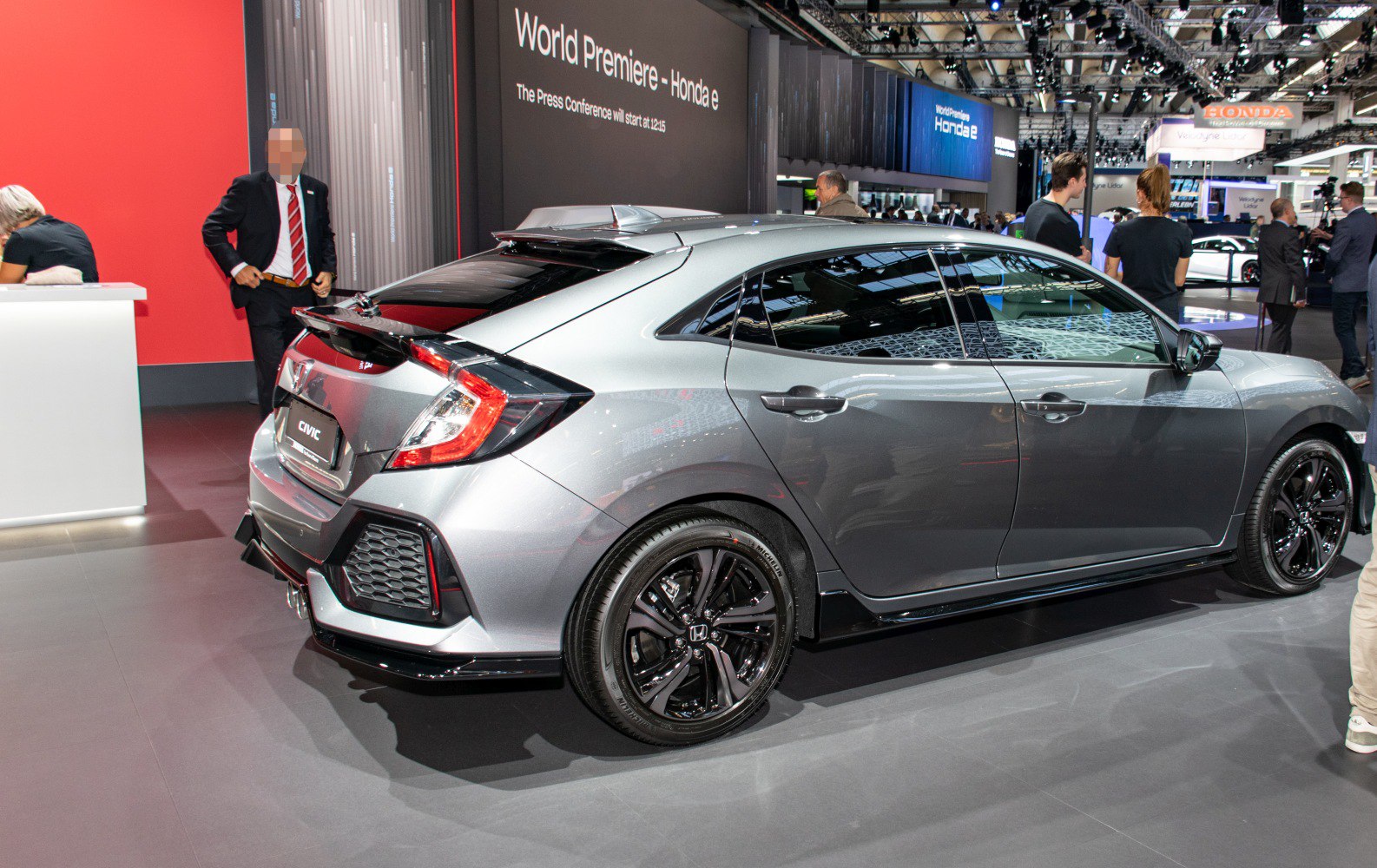 Rear and side view with sporty taillights and black alloy wheels