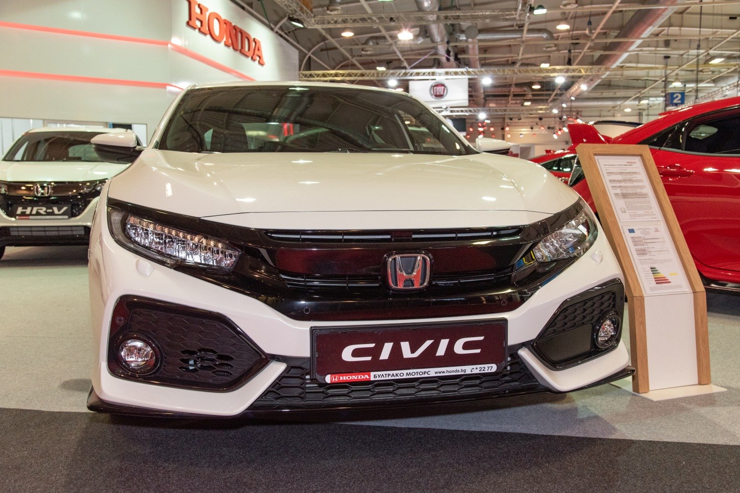 Front grille and sleek headlights of a hatchback