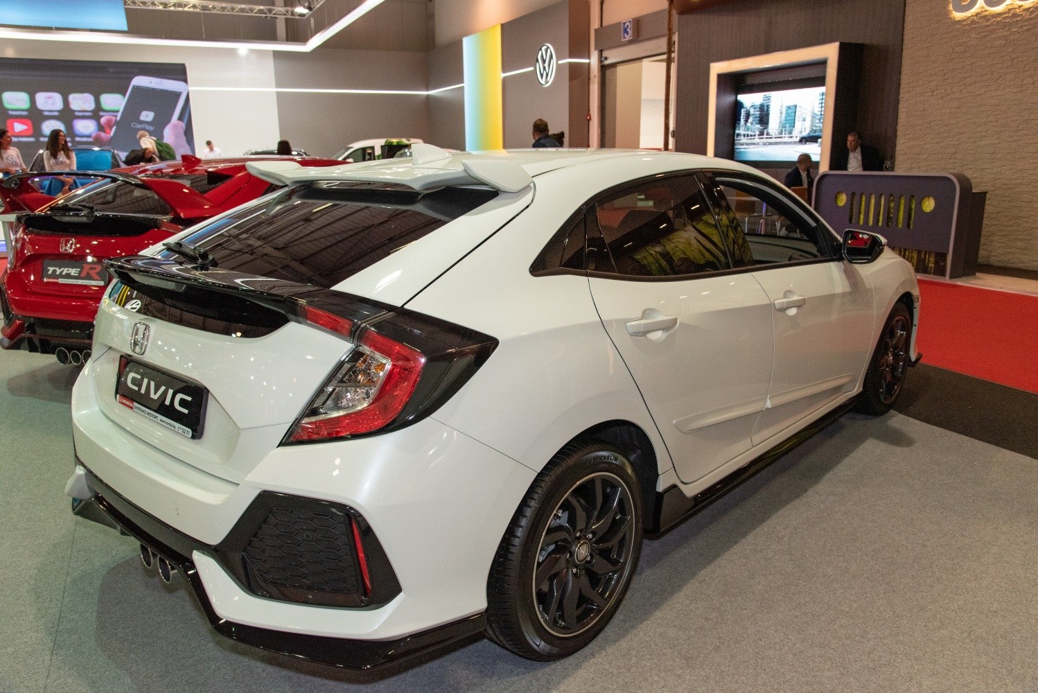 Rear view of hatchback with rear spoiler and black alloy wheels