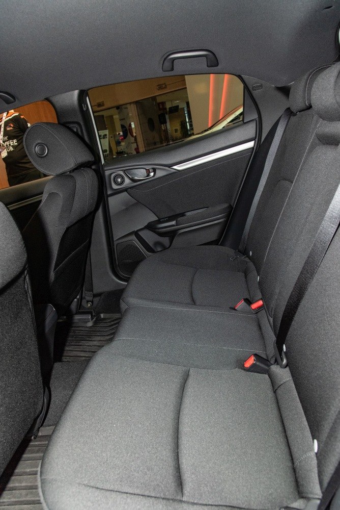 Rear seat interior with fabric upholstery and ergonomic design