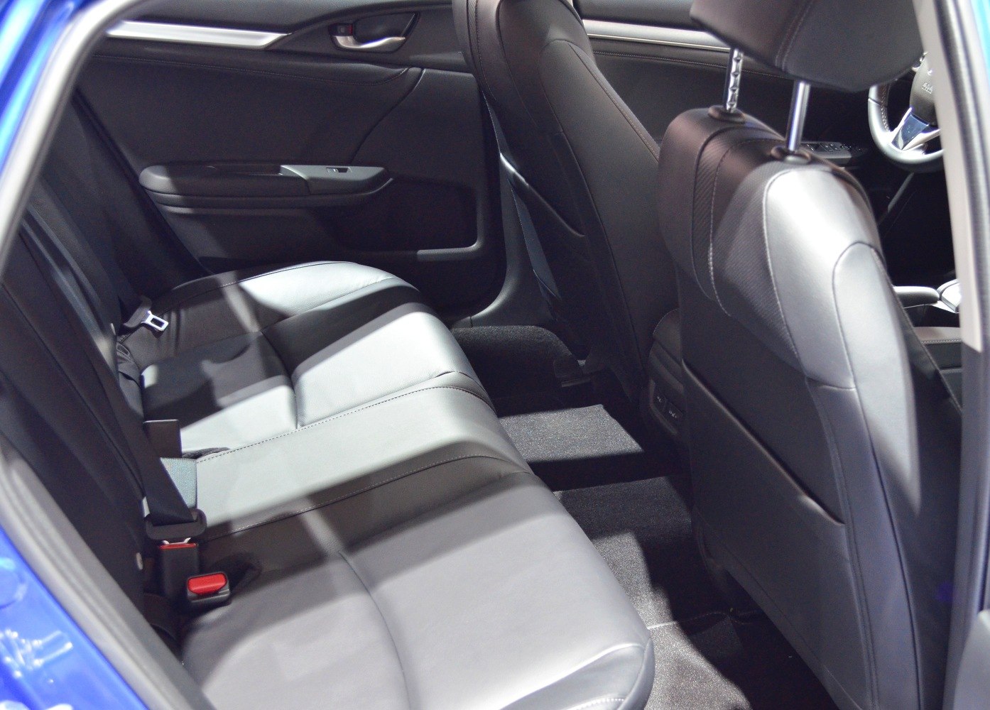 Rear leather seats and interior space of a sedan