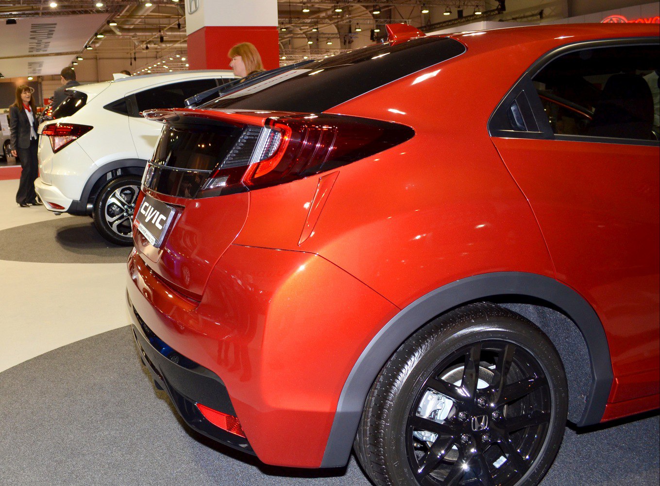 Rear hatchback design with distinct tail lights and black alloy wheels