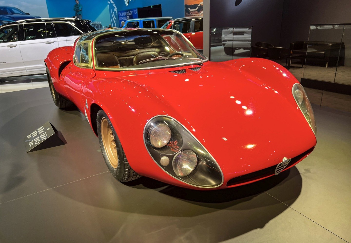 Dual round headlights and sleek curved front body design