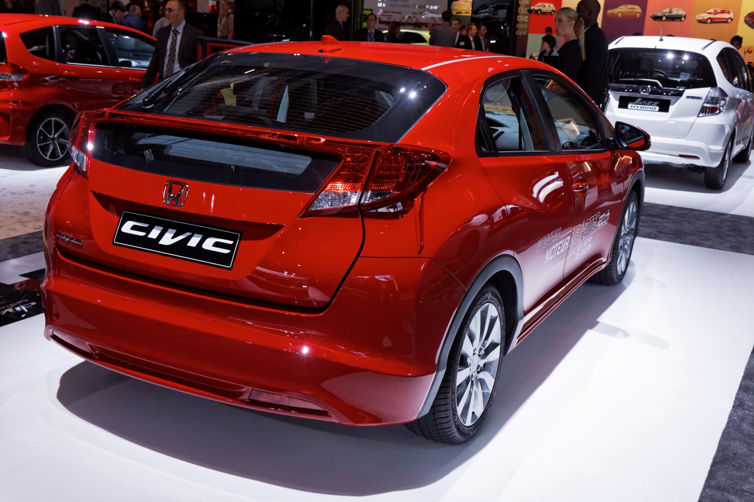 Rear hatchback view with distinctive tail lights and spoiler