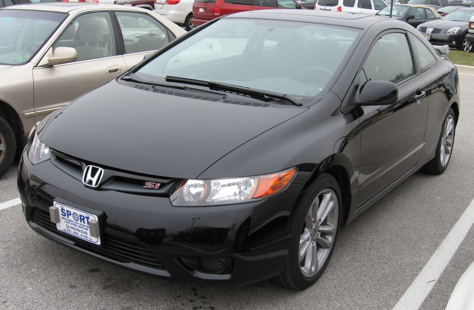 Sporty two-door coupe front view with sleek headlights