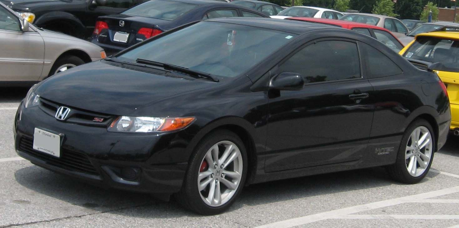 Black sporty coupe with alloy wheels and tinted windows