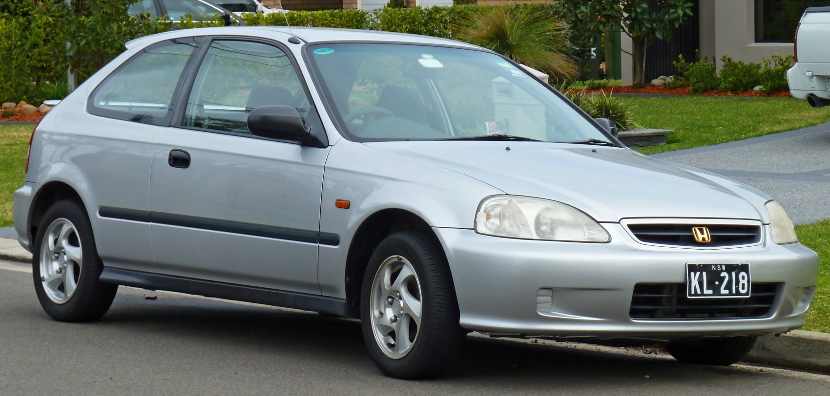 Silver 3-door hatchback front-side view with alloy wheels