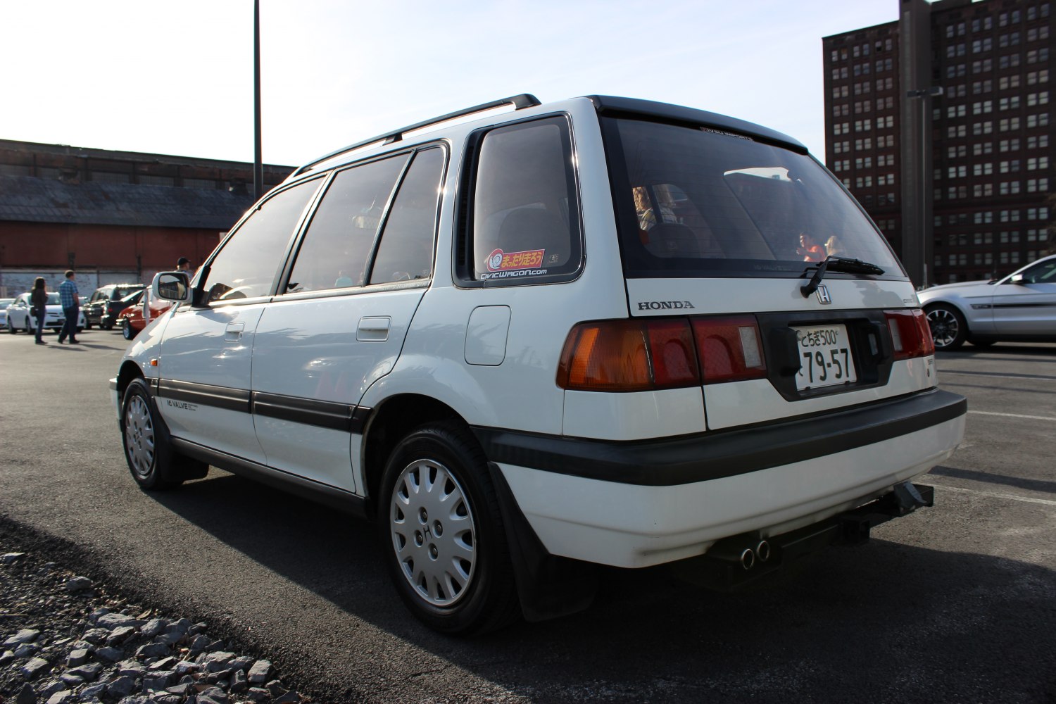 Rear and side view of a classic 1980s wagon with distinct tail lights