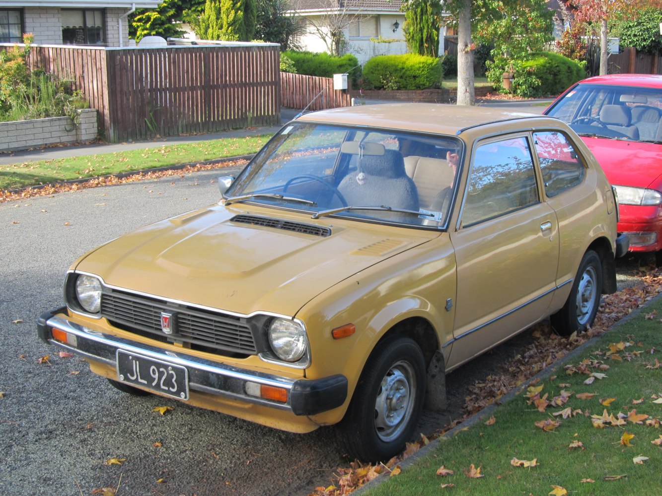 1970s vintage compact hatchback with rounded headlights