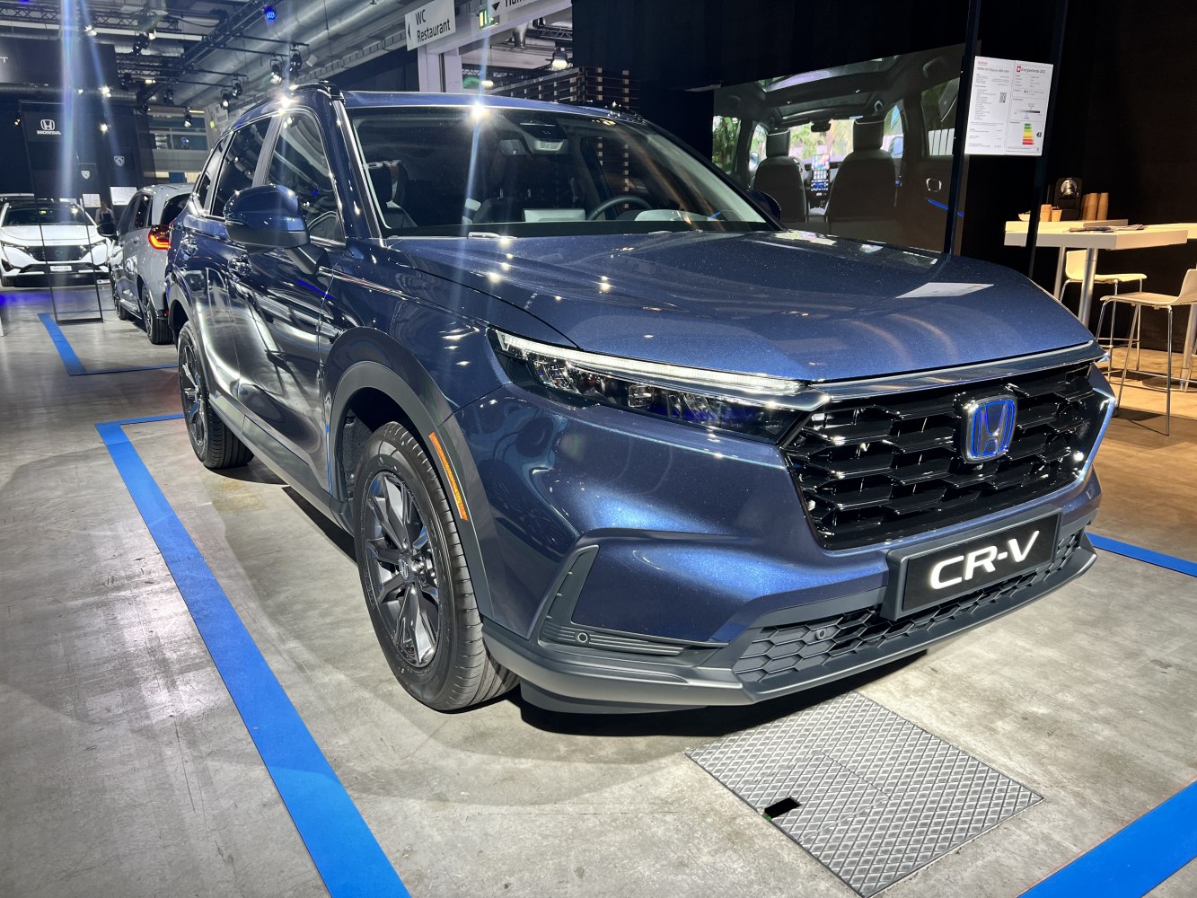 Front view of SUV with LED headlights and distinctive grille design