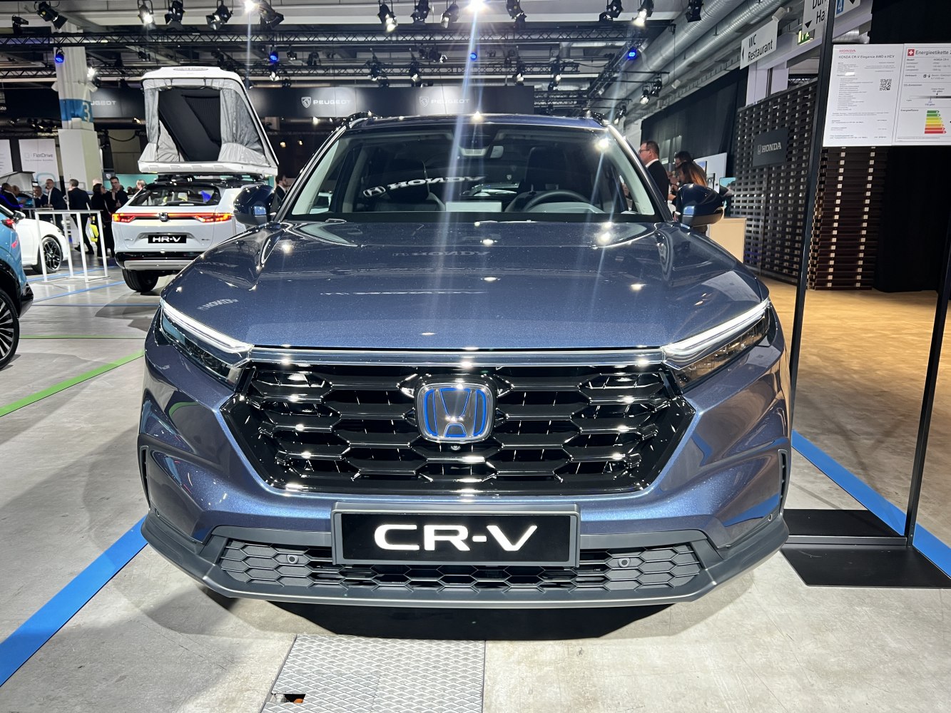 Bold front grille and sleek LED headlights of a modern 2023 SUV