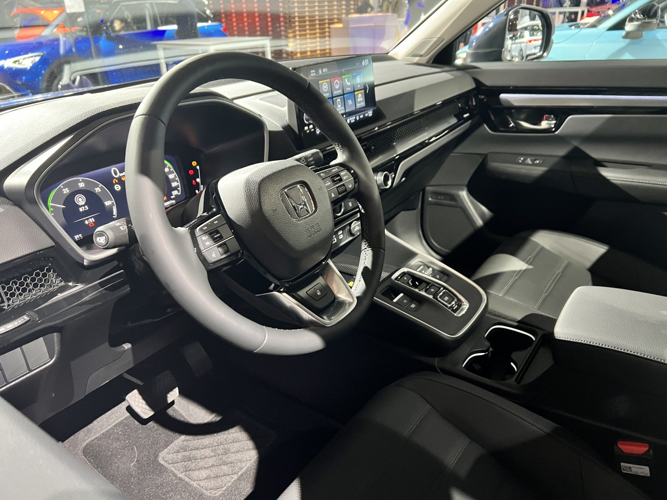 Digital instrument cluster and touchscreen infotainment in a modern SUV interior