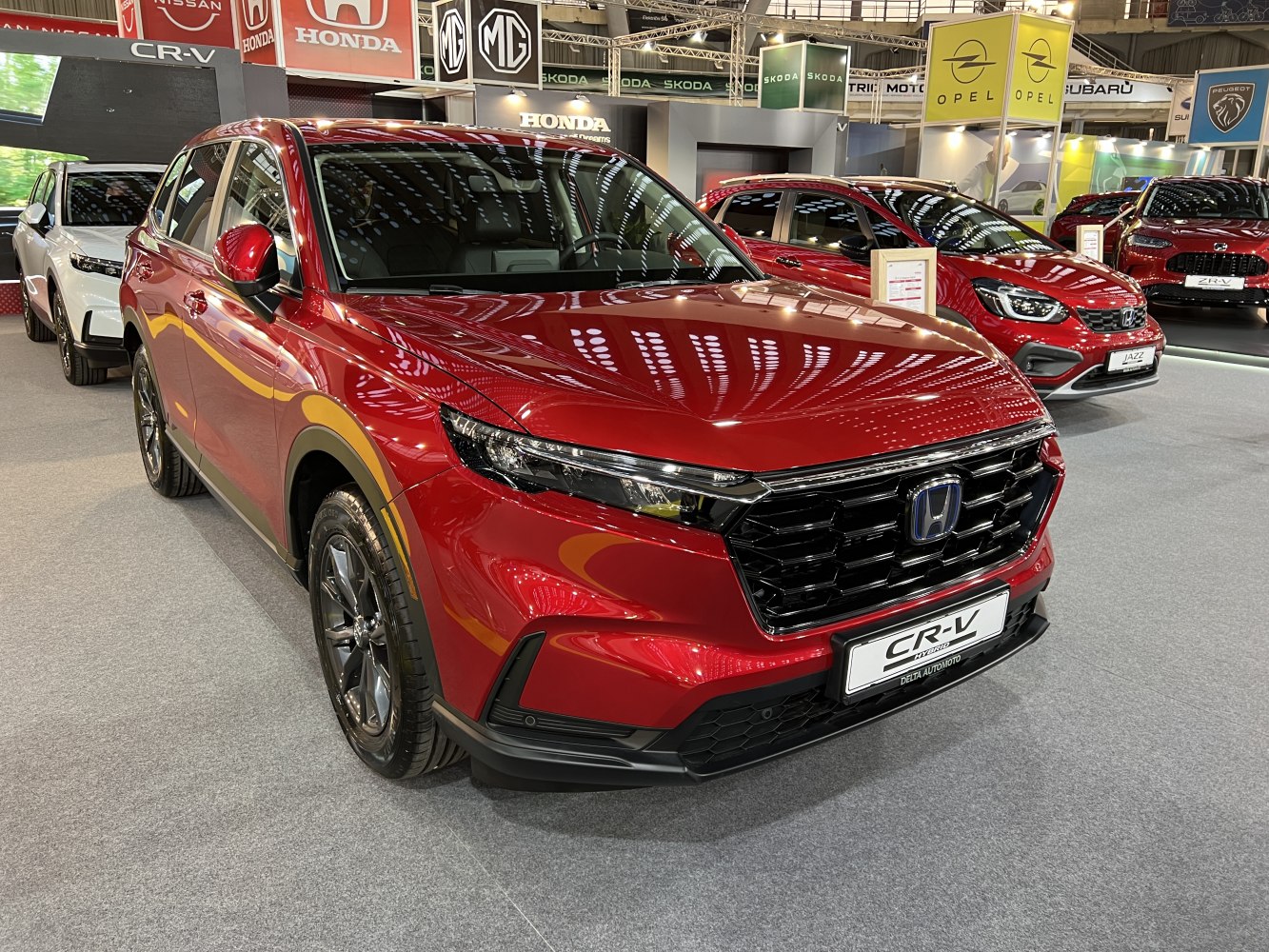 Front grille and sleek headlights of a modern SUV.