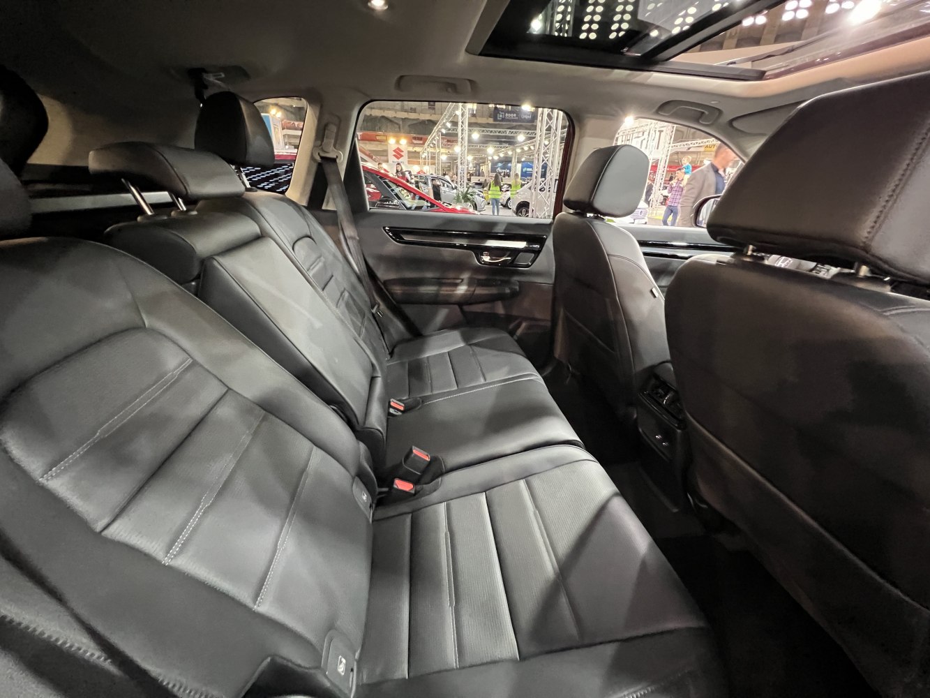 Spacious rear leather seats with panoramic roof and USB ports