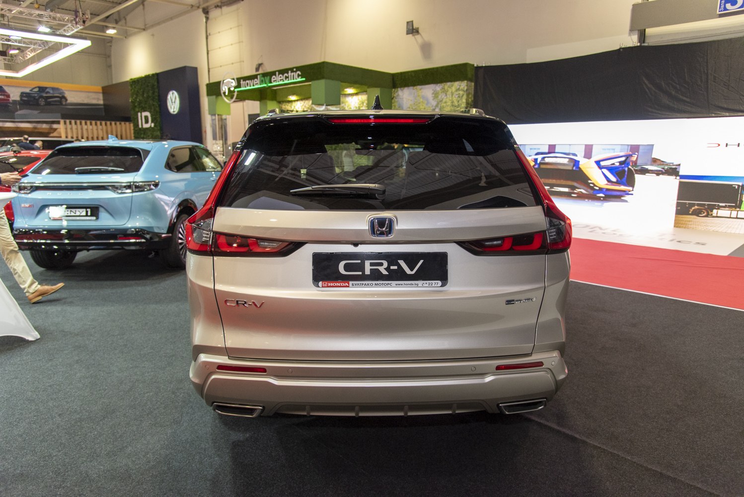 Rear view with distinctive tail lights and dual exhaust tips